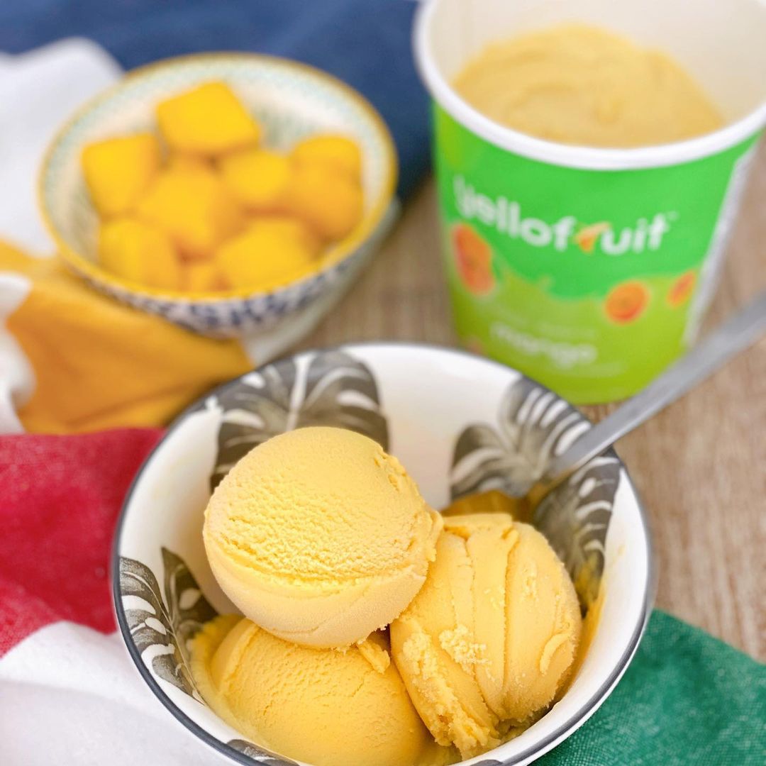 Shows the frozen dessert's texture, consistency, colour in a bowl with the open pint beside it.